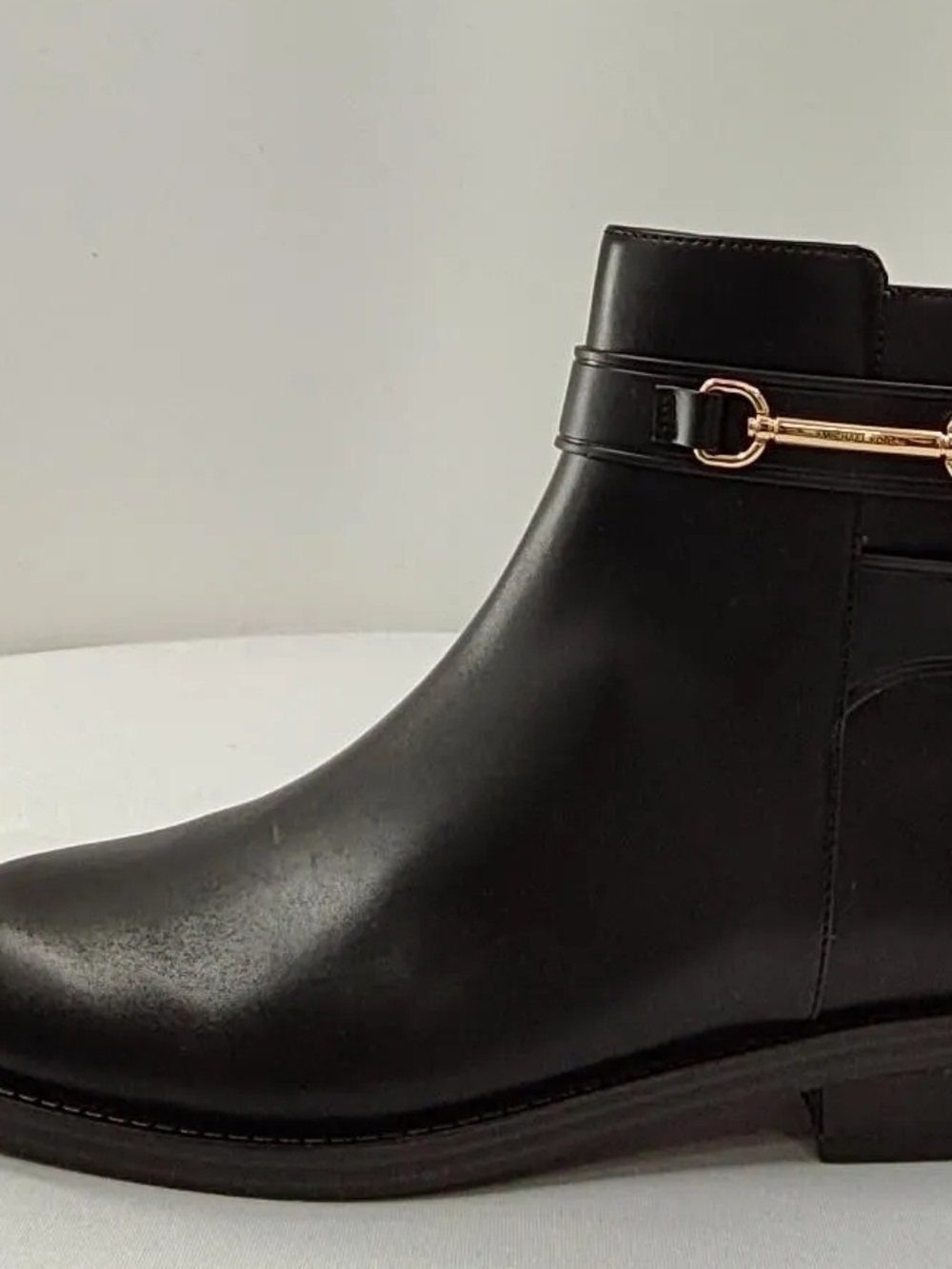 Michael Kors Black Leather Ankle Boot with Gold Buckle Detail
